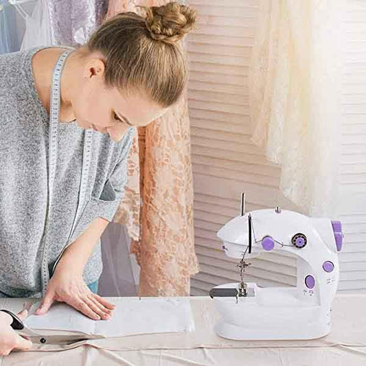 Máquina de coser eléctrica doméstica en miniatura