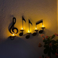 Candelabro con notas musicales